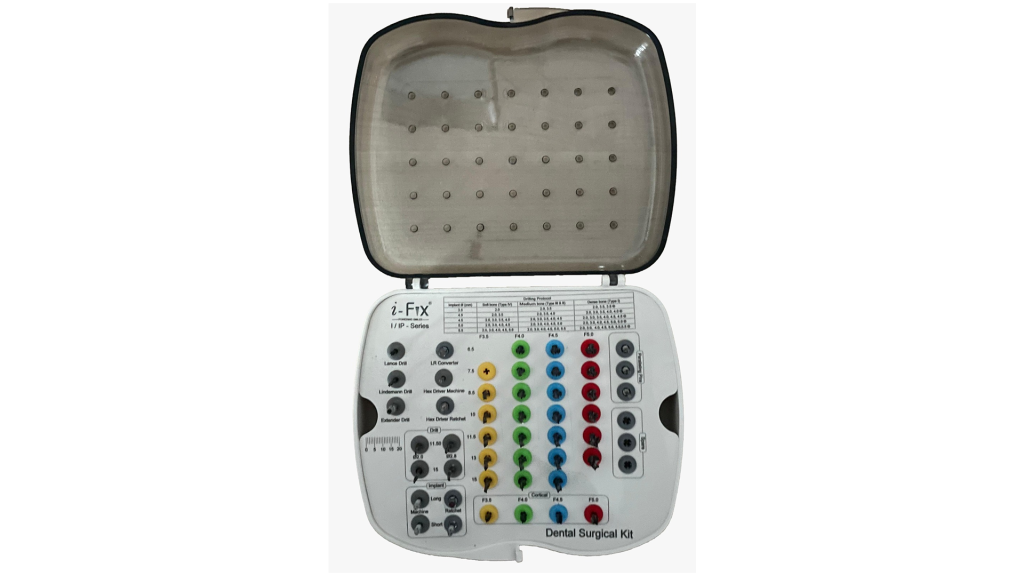 Dental surgical kit with various tools and colored components in a case.